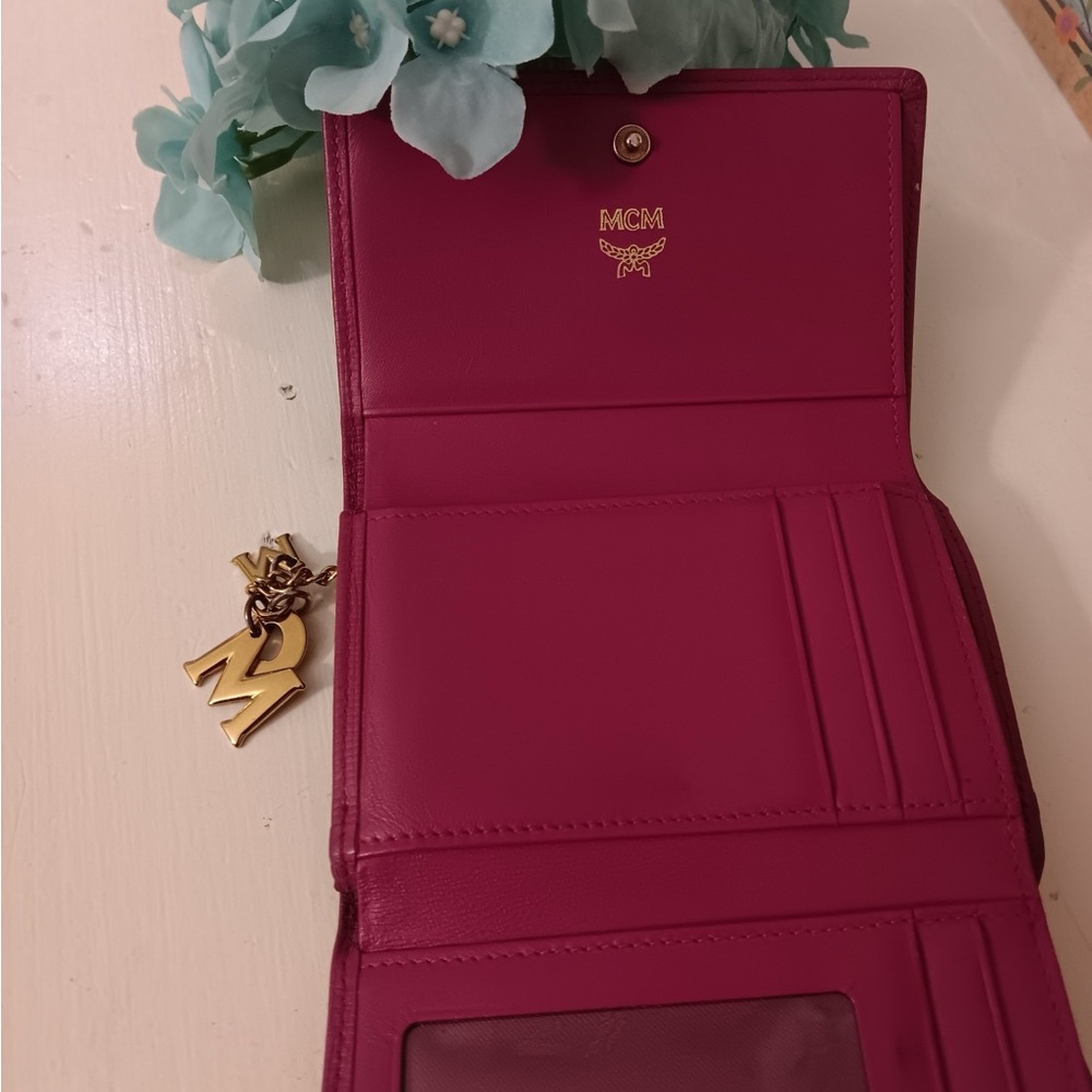MCM trifold wallet with gold hardware and MCM AUTHENTIC charm - Picture 5 of 8
